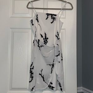 Never been worn white and black cross over dress